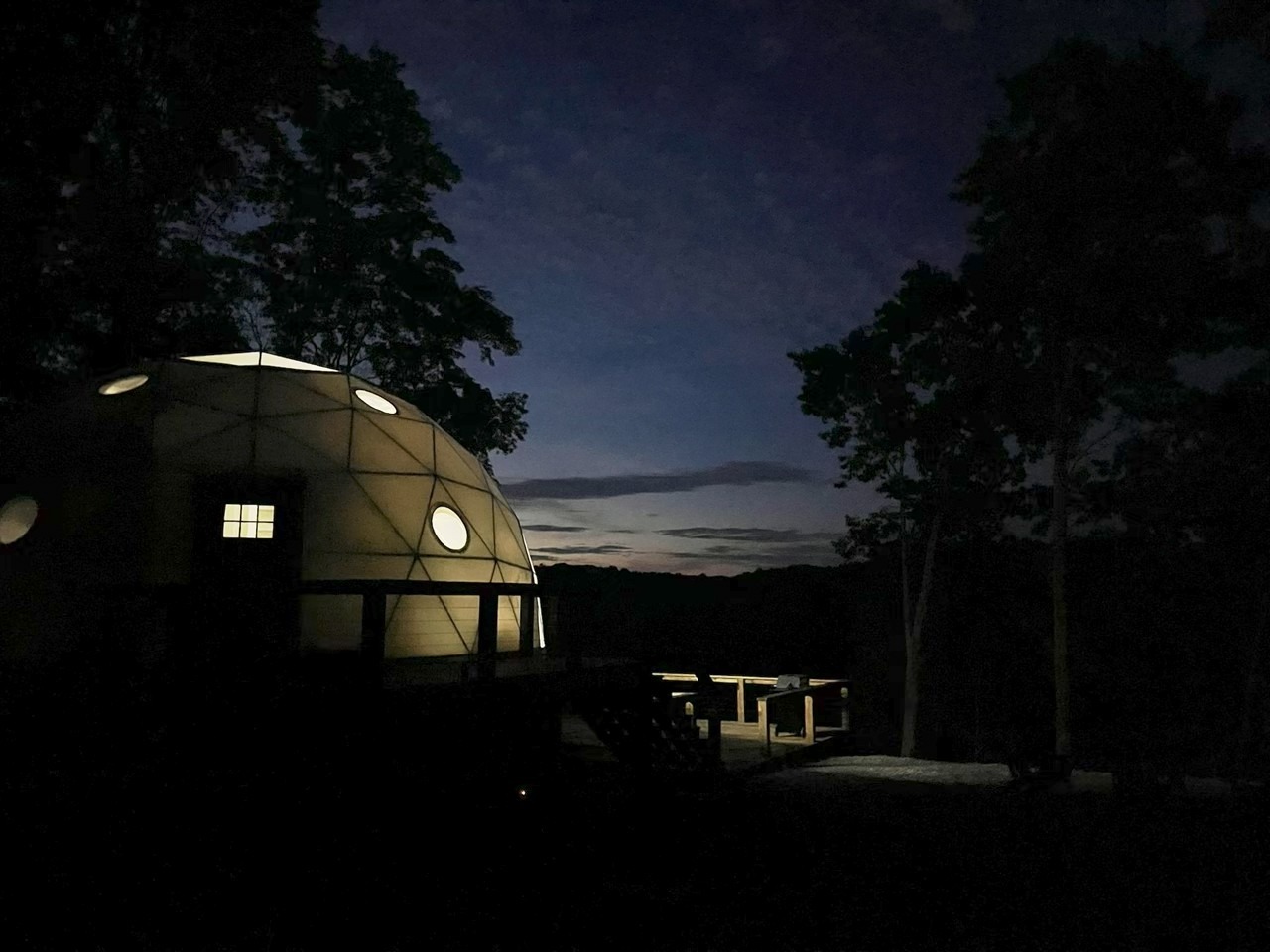 Nestled Inn dome exterior at night
